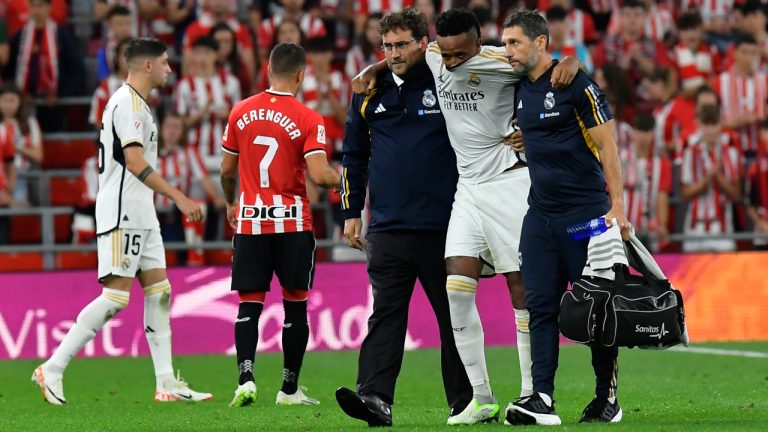 Real Madrid's Eder Militao leaves the pitch after an injury during the Spanish La Liga soccer match between Athletic Club and Real Madrid at the San Mames stadium in Bilbao, Spain, Saturday, Aug. 12, 2023. (Alvaro Barrientos/AP) 