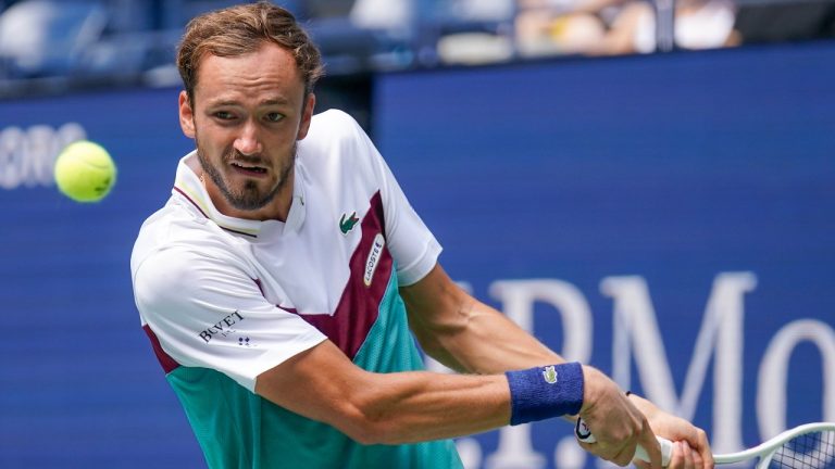 Daniil Medvedev, of Russia, returns a shot to Attila Ballazs, of Hungary, during the first round of the U.S. Open tennis championships, Tuesday, Aug. 29, 2023, in New York. (AP)