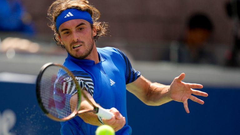 Stefanos Tsitsipas, of Greece, returns a shot to Dominic Stricker, of Switzerland, during the second round of the U.S. Open tennis championships, Wednesday, Aug. 30, 2023, in New York. (AP)