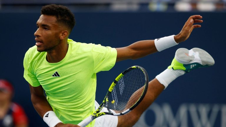 Felix Auger-Aliassime of Canada serves a ball to Max Purcell of Australia during National Bank Open tennis in Toronto, Tuesday, Aug. 8, 2023 (Cole Burston/CP Photo)