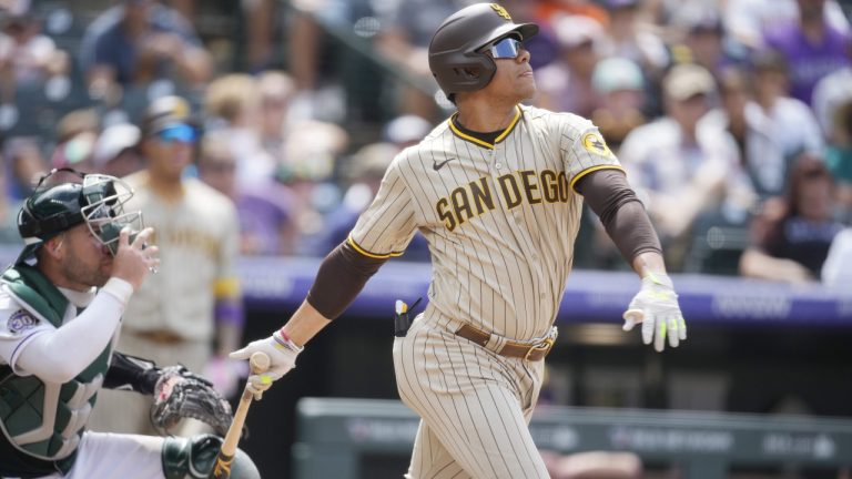 San Diego Padres' Juan Soto singles against Colorado Rockies relief pitcher Brent Suter in the seventh inning of a baseball game, Wednesday, Aug. 2, 2023, in Denver. (David Zalubowski/AP)