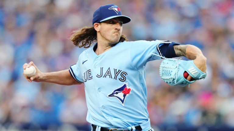 Toronto Blue Jays starting pitcher Kevin Gausman (34) works against the Philadelphia Phillies during first inning MLB interleague baseball action in Toronto on Wednesday, August 16, 2023. (Nathan Denette/CP)