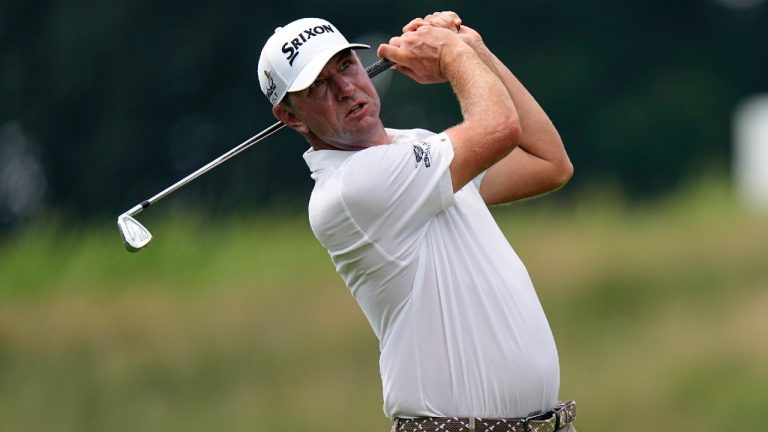 Lucas Glover watches his approach shot from the seventh fairway during the second round of the St. Jude Championship golf tournament Friday, Aug. 11, 2023, in Memphis, Tenn. (George Walker IV/AP)