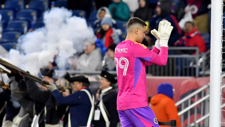 New England Revolution goalkeeper Djordje Petrović (99) reacts after his team's win over CF Montreal in an MLS soccer match Saturday, April 8, 2023, in Foxborough, Mass. (Mark Stockwell/AP)