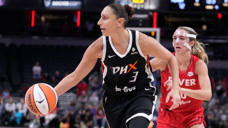 Phoenix Mercury's Diana Taurasi goes to the basket past Indiana Fever's Lexie Hull during the second half of a WNBA basketball game, Tuesday, Aug. 1, 2023, in Indianapolis. (Darron Cummings/AP)