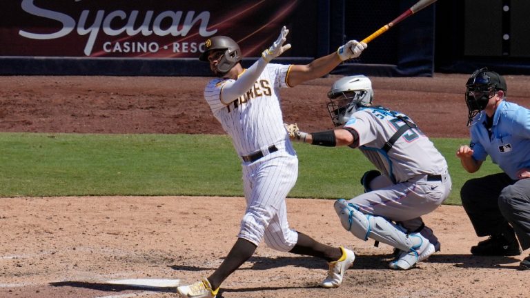 San Diego Padres' Xander Bogaerts watches his two-run home run hit during the sixth inning of a baseball game against the Miami Marlins, Wednesday, Aug. 23, 2023, in San Diego. (Gregory Bull/AP)