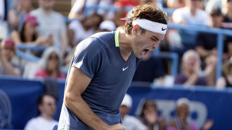 Taylor Fritz celebrates after winning the advantage prior to match point against Andy Murray during the DC Open tennis tournament Friday, Aug. 4, 2023, in Washington. (Minh Connors/The Washington Post via AP)
