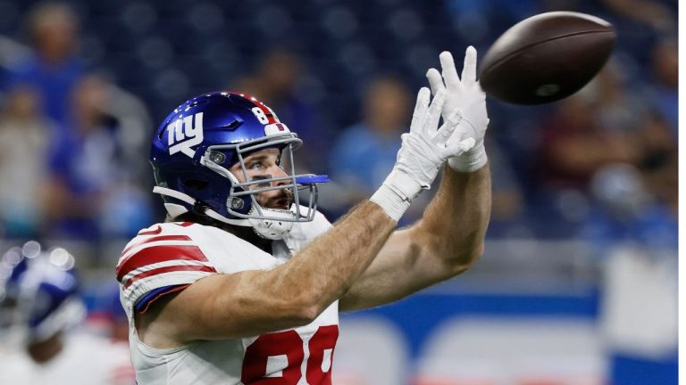 New York Giants tight end Tommy Sweeney  makes a catch while warming up for an NFL preseason football game against the Detroit Lions, Friday, Aug. 11, 2023, in Detroit. (Duane Burleson/AP Photo)
