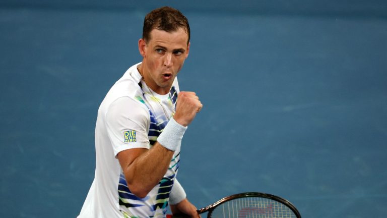 Vasek Pospisil of Canada reacts after winning a point against compatriot Felix Auger-Aliassime during their first round match at the Australian Open tennis championship in Melbourne, Australia, Monday, Jan. 16, 2023. (Asanka Brendon Ratnayake/AP)