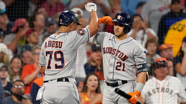 Houston Astros' Jose Abreu (79) celebrates with Yainer Diaz (21) after scoring on his home run in the second inning of a baseball game against the Boston Red Sox, Monday, Aug. 28, 2023, in Boston. (Steven Senne/AP)