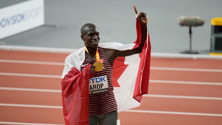 Marco Arop, of Canada celebrates winning the gold medal ahead in the Men's 800-metres final during the World Athletics Championships in Budapest, Hungary, Saturday, Aug. 26, 2023. (Martin Meissner/AP)
