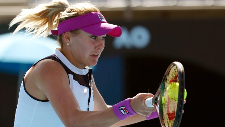 Kateryna Baindl of Ukraine plays a forehand return to Jelena Ostapenko of Latvia during their third round match at the Australian Open tennis championship in Melbourne, Australia, Friday, Jan. 20, 2023. (Asanka Brendon Ratnayake/AP)