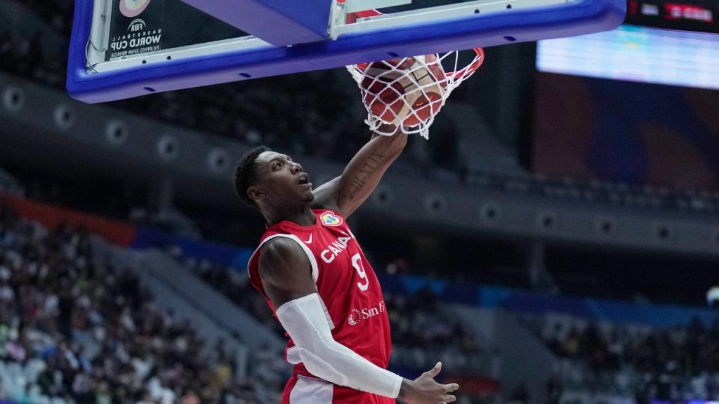 RJ Barrett is pumped after huge one-handed slam for Canada - ESPN