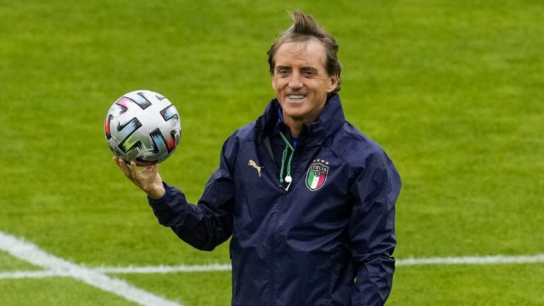 Former Italy manager Roberto Mancini smiles during a training session at the Hive stadium in London, England, on July 5, 2021. (Matt Dunham/AP)