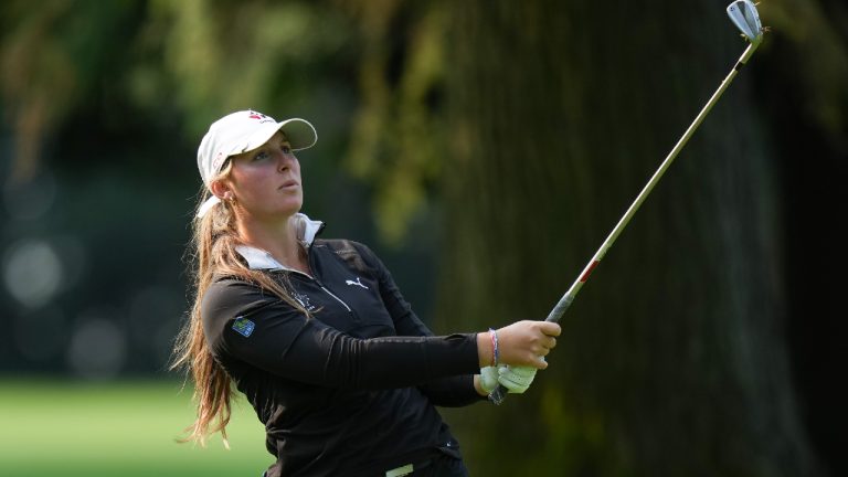 Brooke Rivers, of Canada, watches her second shot from the fairway on the 14th hole during the first round at the LPGA CPKC Canadian Women's Open golf tournament, in Vancouver, B.C., Thursday, Aug. 24, 2023. (Darryl Dyck/CP)