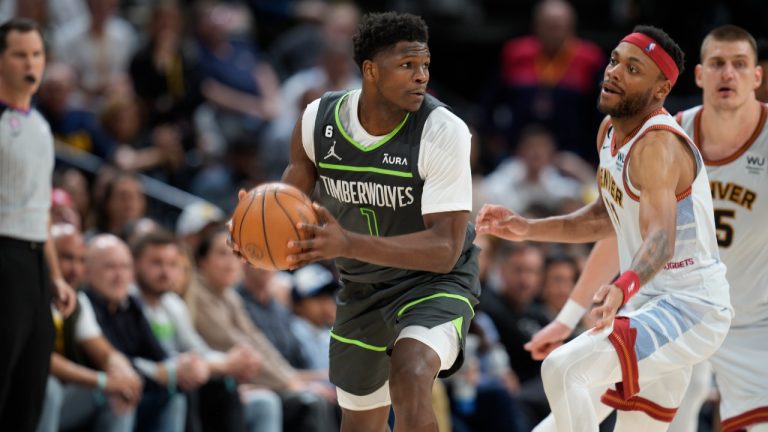 Minnesota Timberwolves guard Anthony Edwards (1) and Denver Nuggets forward Bruce Brown (11) in the second half of Game 5 of an NBA basketball first-round playoff series Tuesday, April 25, 2023, in Denver. (David Zalubowski/AP)
