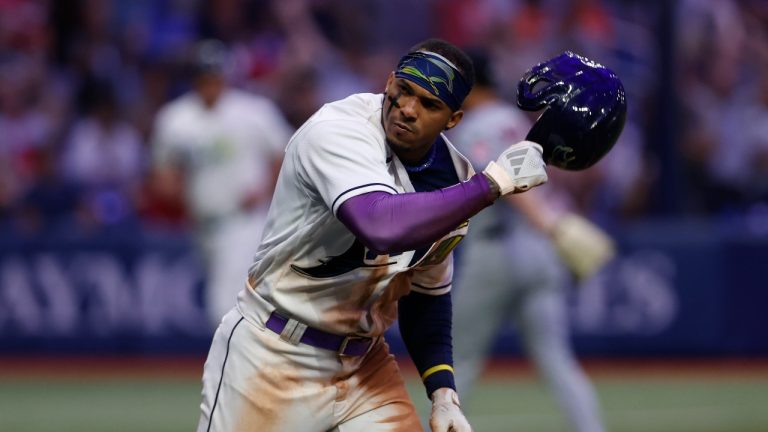 Tampa Bay Rays' Wander Franco tosses his helmet after hitting a walkoff home run against the Cleveland Guardians during the ninth inning of a baseball game Friday, Aug. 11, 2023, in St. Petersburg, Fla. (Scott Audette/AP Photo)