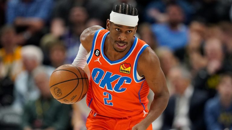 Oklahoma City Thunder guard Shai Gilgeous-Alexander brings the ball upcourt during the first half of an NBA basketball game against the Utah Jazz, Thursday, April 6, 2023, in Salt Lake City. (Rick Bowmer/AP)
