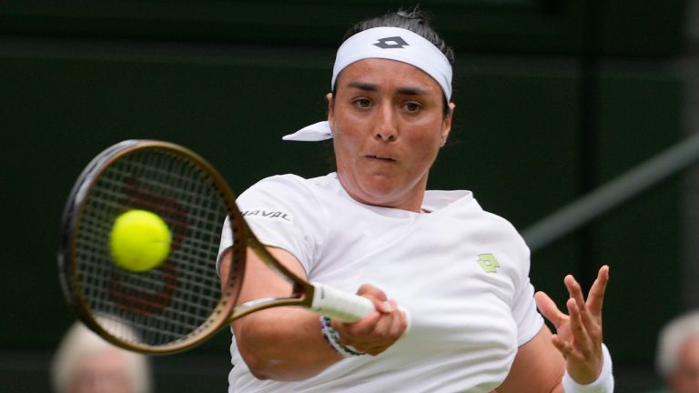 FILE - Tunisia's Ons Jabeur returns to Kazakhstan's Elena Rybakina in a women's singles match on day ten of the Wimbledon tennis championships in London, Wednesday, July 12, 2023. (Kirsty Wigglesworth/AP)