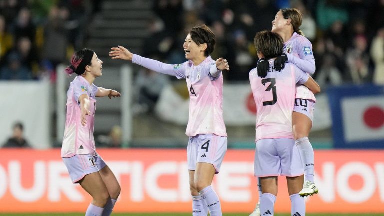 Japan's players celebrate after Hinata Miyazawa scored their third goal during the Women's World Cup second round soccer match between Japan and Norway in Wellington, New Zealand. (Alessandra Tarantino/AP)