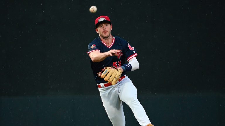 Boston Red Sox shortstop Trevor Story is throws to first base during a rehab game for the Portland Sea Dogs, Friday, July 22, 2023, in Portland, Maine. Story underwent elbow surgery in January. (Shawn Patrick Ouellette/Portland Press Herald, via AP)
