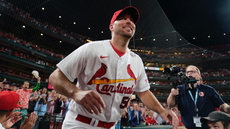 St. Louis Cardinals starting pitcher Adam Wainwright celebrates after earning the win over the Milwaukee Brewers in a baseball game for his 200th career victory Monday, Sept. 18, 2023, in St. Louis. (Jeff Roberson/AP)