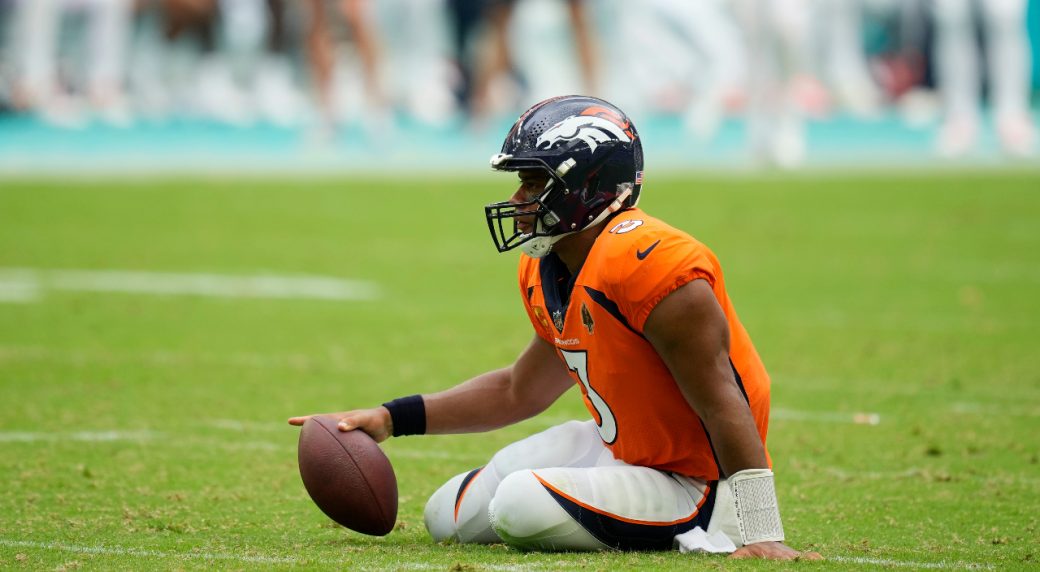 Wilson says Broncos threatened to bench him if he did not alter