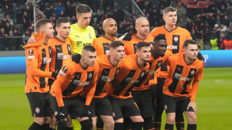 Shakhtar players pose ahead of the Europa League round of 16 first leg soccer match between Shakhtar Donetsk and Feyenoord, at Polish Army Stadium in Warsaw, Poland, Thursday, March 9, 2023. (Czarek Sokolowski/AP)