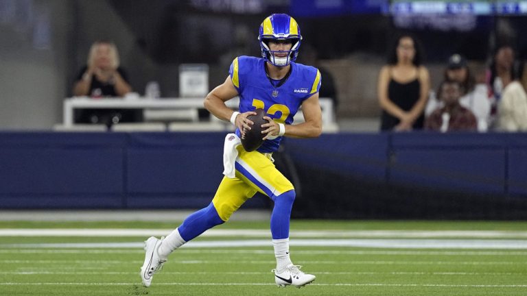 Los Angeles Rams quarterback Stetson Bennett runs against the Las Vegas Raiders during the first half of a preseason NFL football game Saturday, Aug. 19, 2023, in Inglewood, Calif. (Mark J. Terrill/AP)