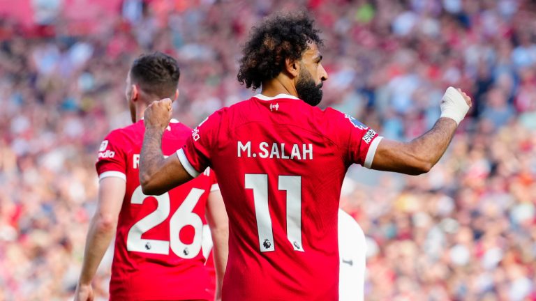 Liverpool's Mohamed Salah celebrates after scoring his side's third goal during the English Premier League soccer match between Liverpool and Aston Villa at Anfield stadium in Liverpool, Sunday, Sept. 3, 2023. (Jon Super/AP) 