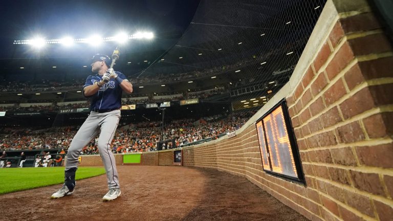 The pitch clock is seen as Tampa Bay Rays' Luke Raley stands near the on deck circle in the second inning of a baseball game against the Baltimore Orioles, Thursday, Sept. 14, 2023, in Baltimore. (Julio Cortez/AP)