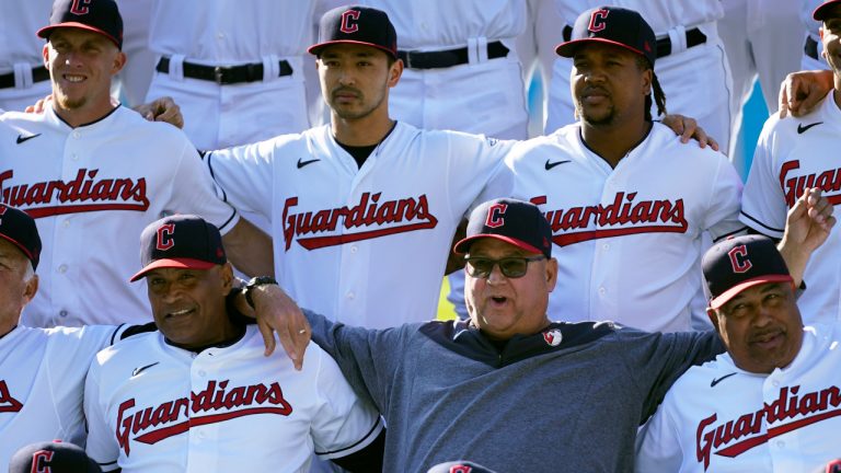 Cleveland Guardians manager Terry Francona, center, poses with the team for a photo before a baseball game Friday, Sept. 22, 2023, against the Baltimore Orioles, in Cleveland. (Sue Ogrocki/AP) 