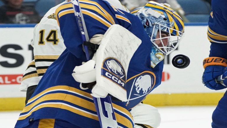 Buffalo Sabres' Devon Levi blocks a Boston Bruins shot during an NHL hockey preseason game Tuesday, Sept. 26, 2023, in Buffalo, N.Y. (Joshua Bessex/The Buffalo News via AP)