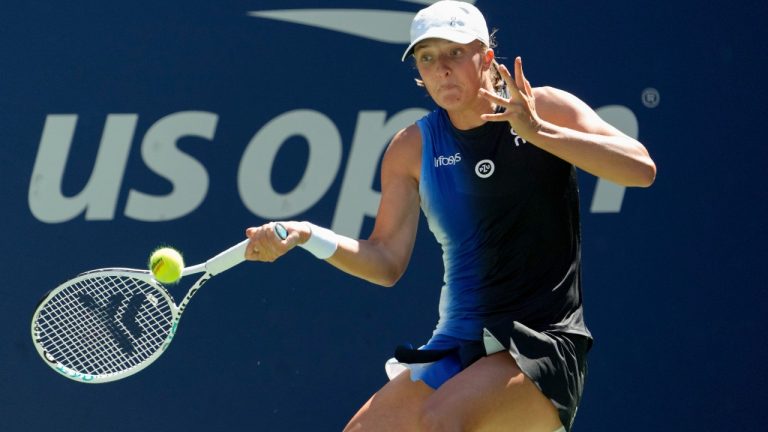 Iga Swiatek, of Poland, returns a shot to Kaja Juvan, of Slovenia, during the third round of the U.S. Open tennis championships, Friday, Sept. 1, 2023, in New York. (Mary Altaffer/AP)