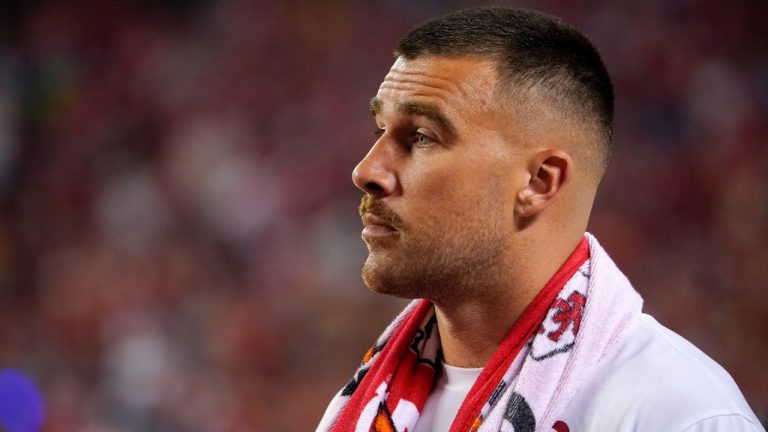 Kansas City Chiefs tight end Travis Kelce watches from the sidelines during the first half of an NFL football game against the Detroit Lions Thursday, Sept. 7, 2023, in Kansas City, Mo. (Ed Zurga/AP)