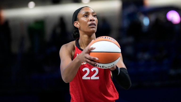 Las Vegas Aces' A'ja Wilson sets up to take a shot during a WNBA basketball game against the Dallas Wings, Tuesday, Aug. 8, 2023, in Arlington, Texas. (Tony Gutierrez/AP)