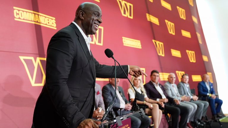 Magic Johnson speaks at an introductory NFL football news conference at FedEx Field in Landover, Md., Friday, July 21, 2023. Magic Johnson made a surprise appearance at Washington Commanders practice Wednesday, Sept. 6, 2023, talking to players and coaches for the first time since becoming a part-owner of the NFL franchise. (Alex Brandon/AP)