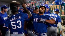 Garcia, Dunning push Rangers to brink of playoff berth in win over the Angels