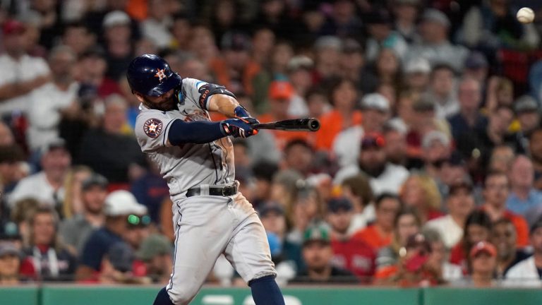 Houston Astros' Jose Altuve hits a two-run triple in the sixth inning of a baseball game against the Boston Red Sox, Monday, Aug. 28, 2023, in Boston. (Steven Senne/AP)