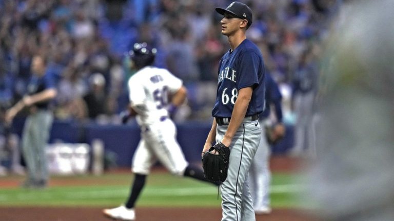 Seattle Mariners starting pitcher George Kirby (68) reacts as Tampa Bay Rays' Rene Pinto (50) runs around the bases after his two-run home run during the seventh inning of a baseball game Friday, Sept. 8, 2023, in St. Petersburg, Fla. (Chris O'Meara/AP)