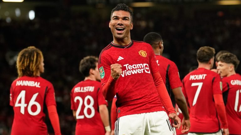 Manchester United's Casemiro celebrates after scoring his side's second goal during the English League Cup third round soccer match between Manchester United and Crystal Palace at Old Trafford stadium in Manchester, England, Tuesday, Sept. 26, 2023. (Dave Thompson/AP)