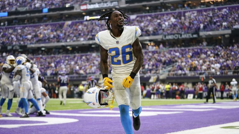 Los Angeles Chargers cornerback Asante Samuel Jr. celebrates after an interception by teammate linebacker Kenneth Murray Jr. in the end zone during the second half of an NFL football game against the Minnesota Vikings. (Abbie Parr/AP)