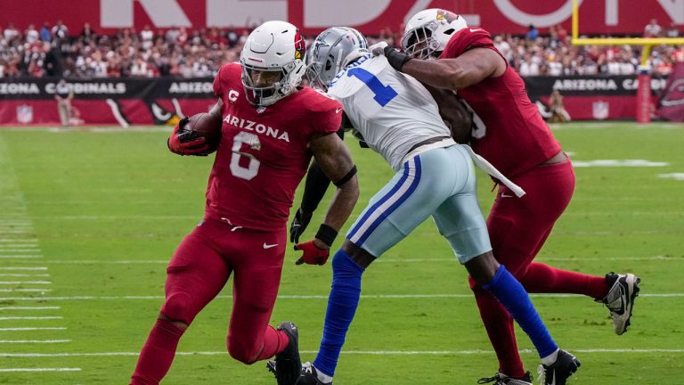 Arizona Cardinals running back James Conner (6) runs into the end zone for a touchdown against the Dallas Cowboys during the first half of an NFL football game. (Rick Scuteri/AP)