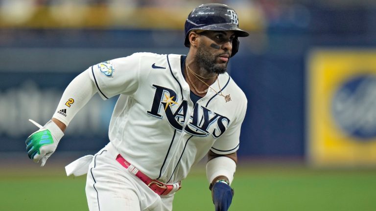 Tampa Bay Rays' Yandy Diaz reacts home to score on an RBI double by Isaac Paredes off Los Angeles Angels starting pitcher Griffin Canning during the first inning of a baseball game Thursday, Sept. 21, 2023, in St. Petersburg, Fla. (Chris O'Meara/AP)