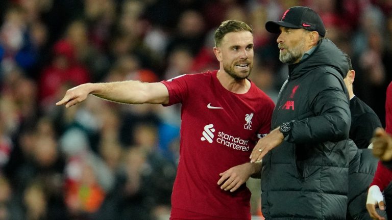 Liverpool's Jordan Henderson gestures as he talks with Liverpool's manager Jurgen Klopp during the English Premier League soccer match between Liverpool and Fulham, at Anfield Stadium, Liverpool, England, Wednesday, May 3, 2023. (Jon Super/AP)