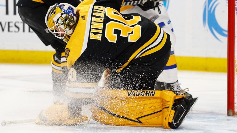 Boston Bruins goaltender Keith Kinkaid (30) covers the puck during the first period of the team's NHL hockey game against the Buffalo Sabres on Saturday, Nov. 12, 2022, in Buffalo, N.Y. (Jeffrey T. Barnes/AP)