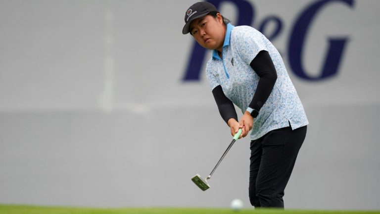 Ruixin Liu, of China, putts on the 18th green during the first round of the LPGA Tour Kroger Queen City Championship golf tournament in Cincinnati, Thursday, Sept. 7, 2023. (Aaron Doster/AP)