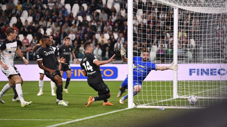 Torino's Arkadiusz Milik, centre, scores the opening goal during the Serie A soccer match between Juventus FC and Lecce in Torino, Italy, Tuesday, Sept. 26, 2023. (Fabio Ferrari/LaPresse via AP)