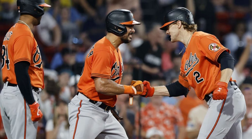 McCann homers twice, Orioles hang on to beat Red Sox for seventh straight win