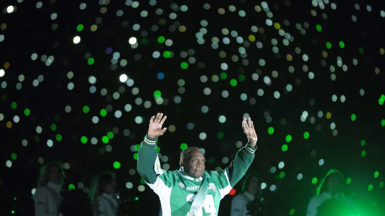Saskatchewan Roughriders great George Reed addresses the crowd following the last ever game at Mosaic Stadium in Regina on Saturday, Oct. 29, 2016. (Mark Taylor/CP)